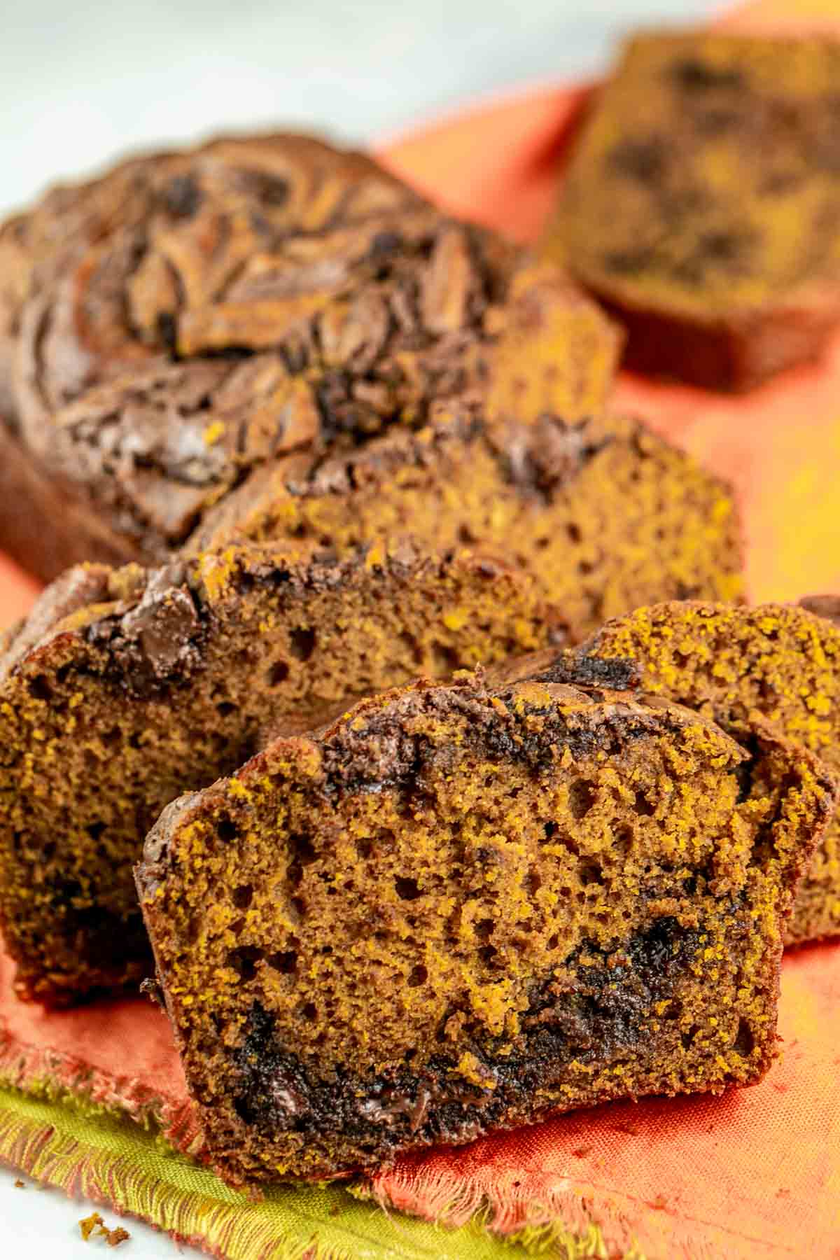 slices of pumpkin bread with visible swirls of nutella in the middle.