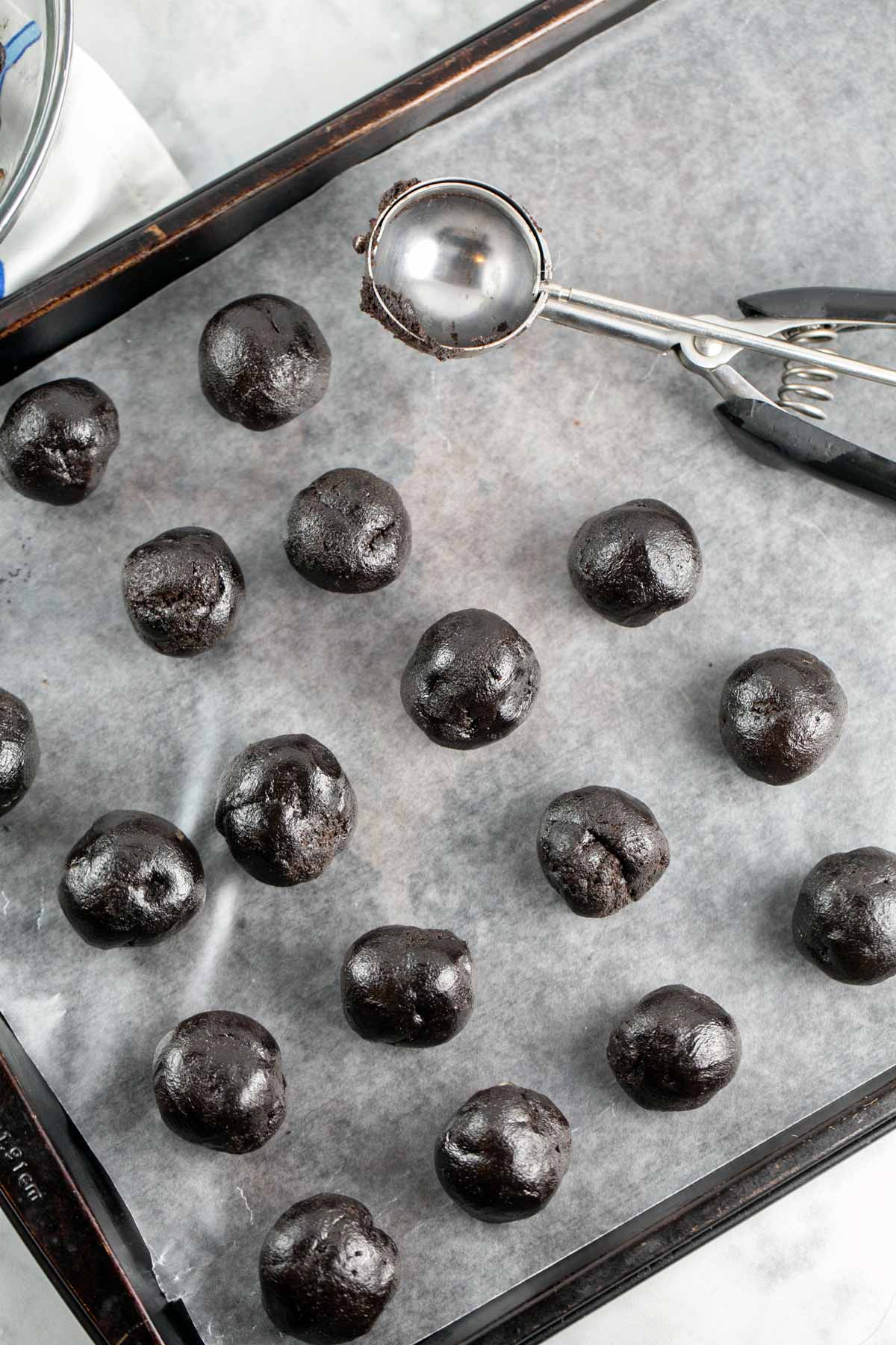 rolled scoops of oreos mixed with cream cheese