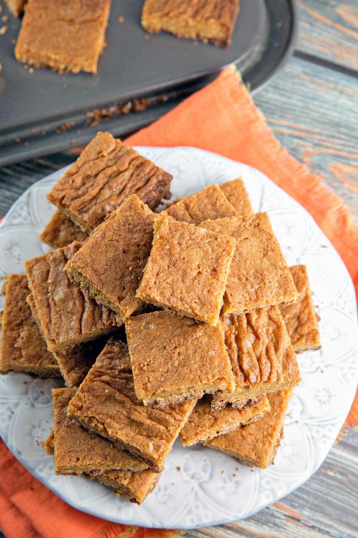 pile of stacked butterscotch blondies on a plate