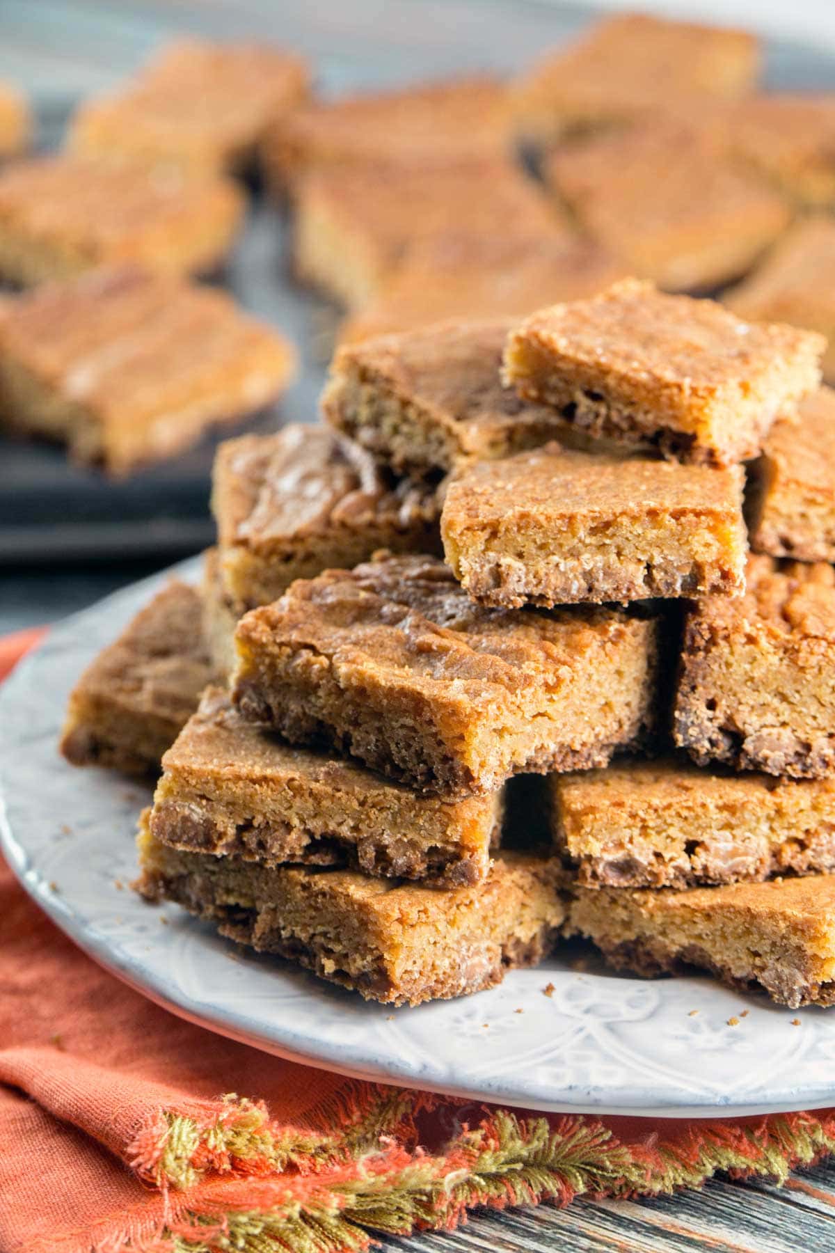 side view of a stack of golden brown blondies