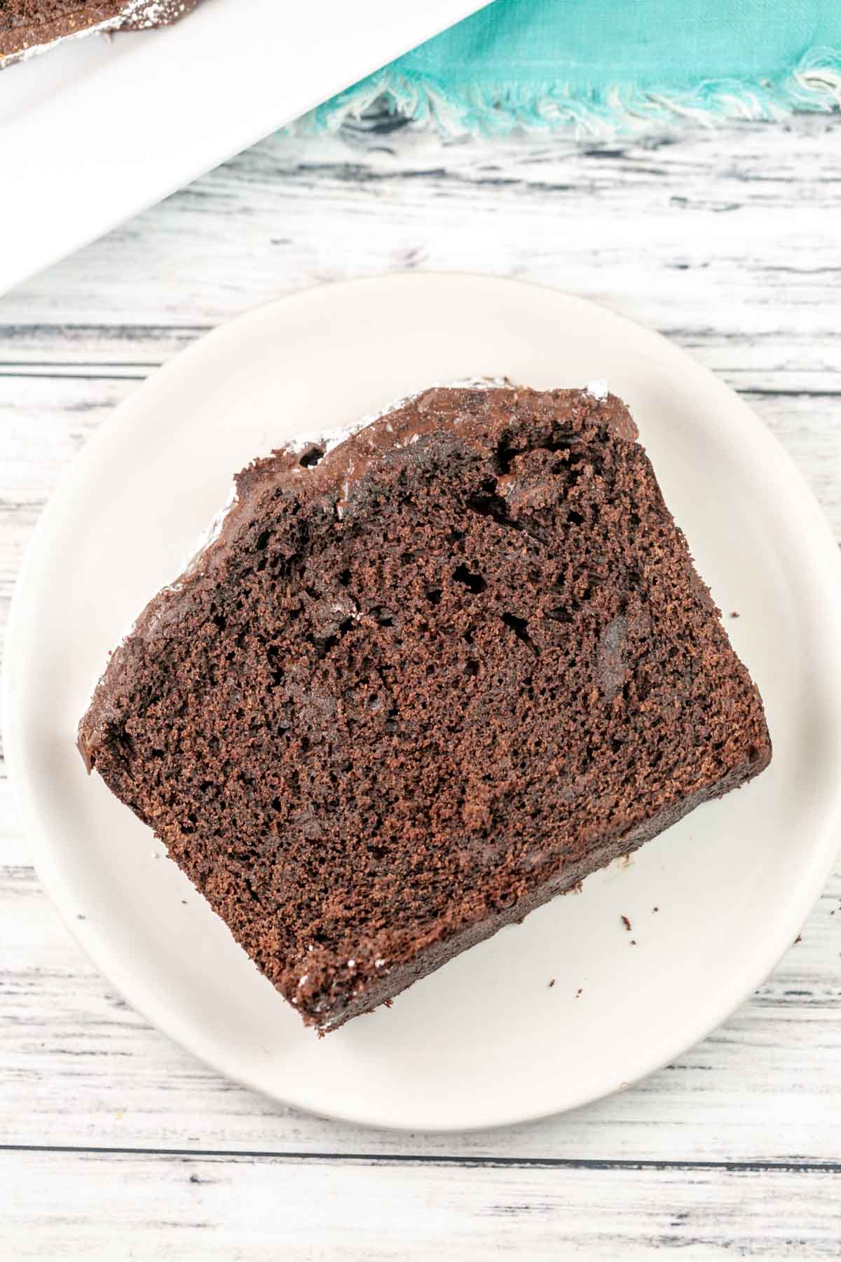 slice of chocolate quick bread on a white plate