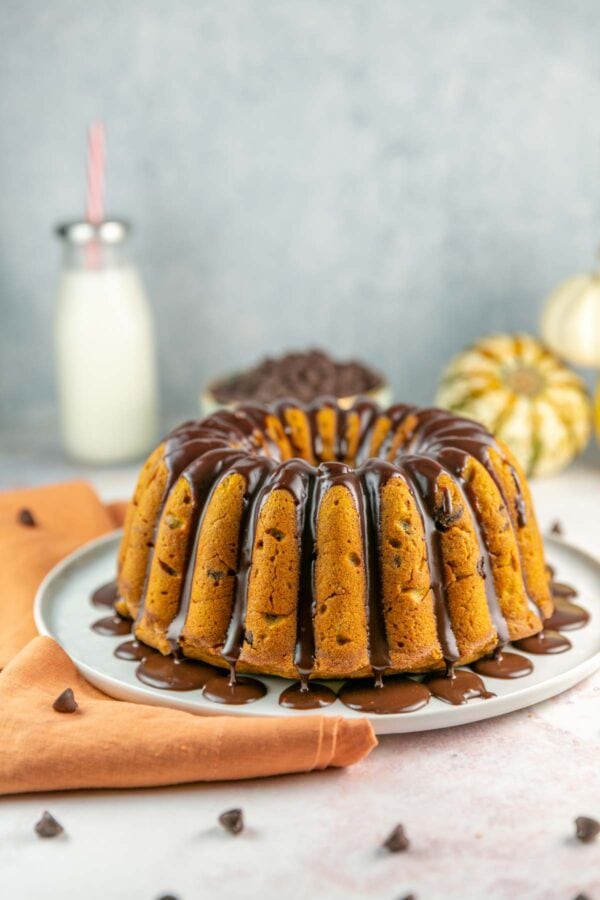 bundt cake with chocolate ganache dripping down the sides