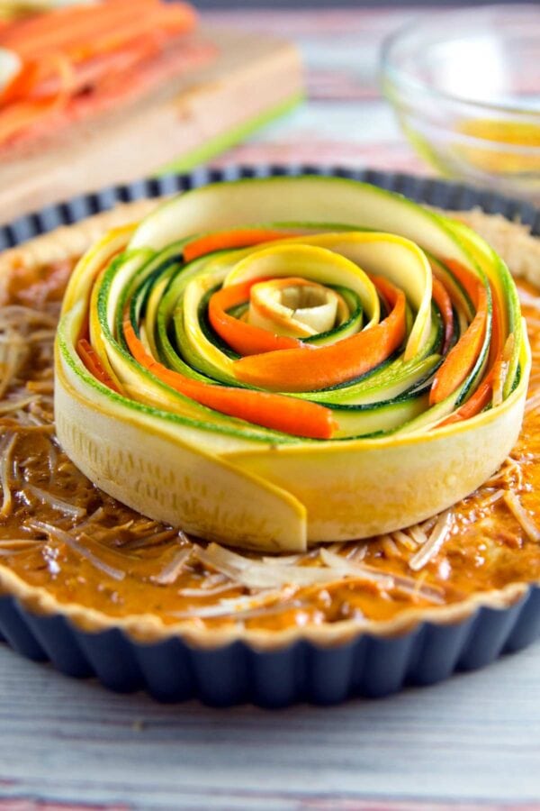 spirals of vegetables in the center of a pie crust