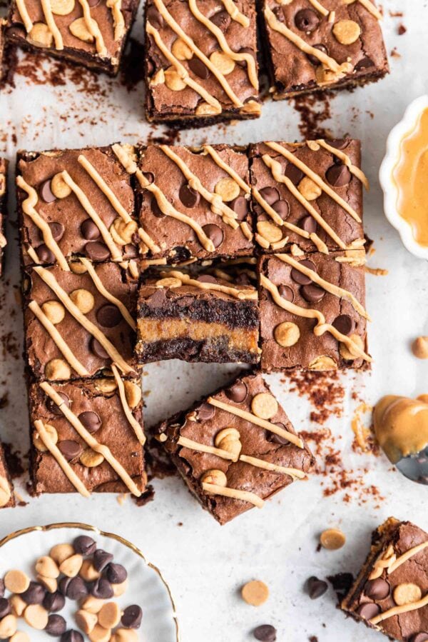 peanut butter stuffed brownies on a sheet of parchment paper