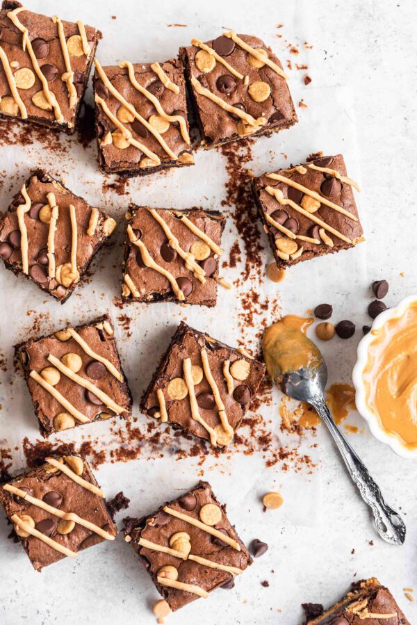 overhead view of brownies studded with chocolate and peanut butter chips