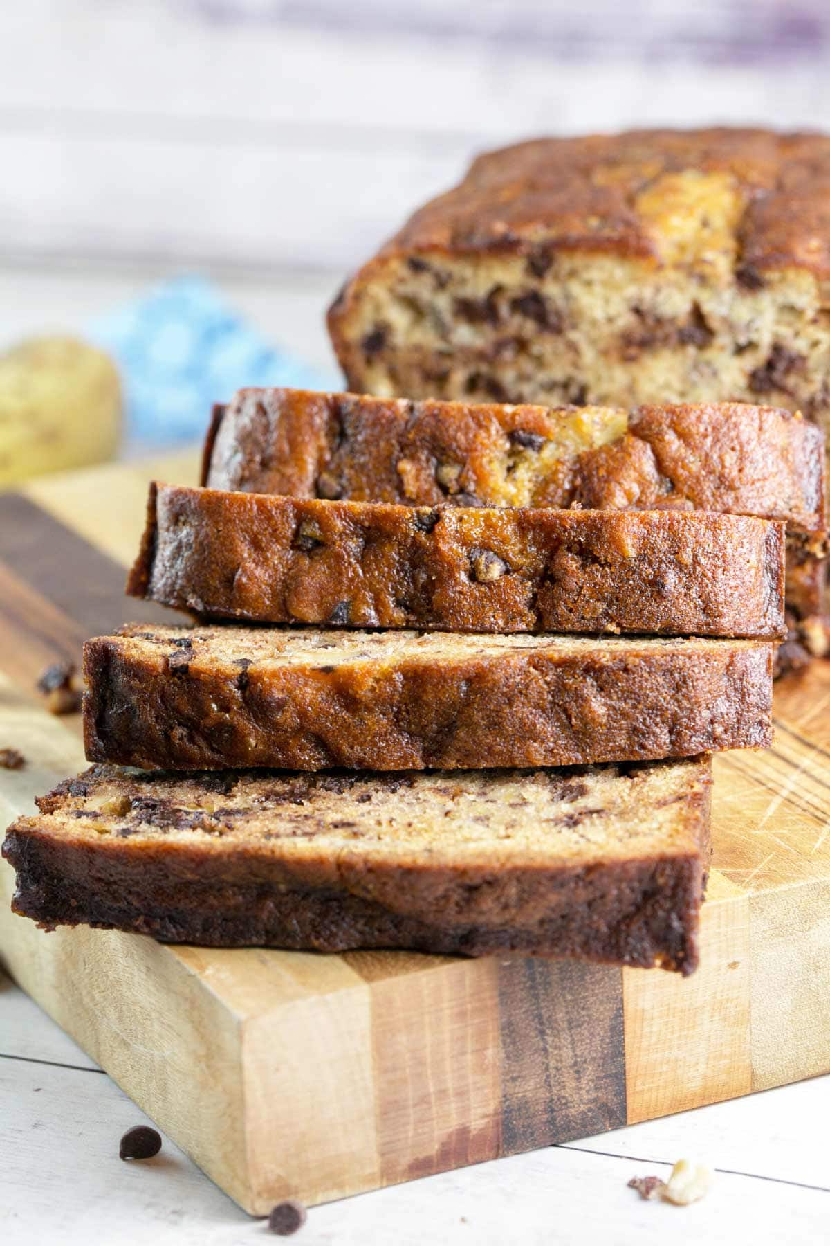 slices of baked bread arranged on a wooden cutting board