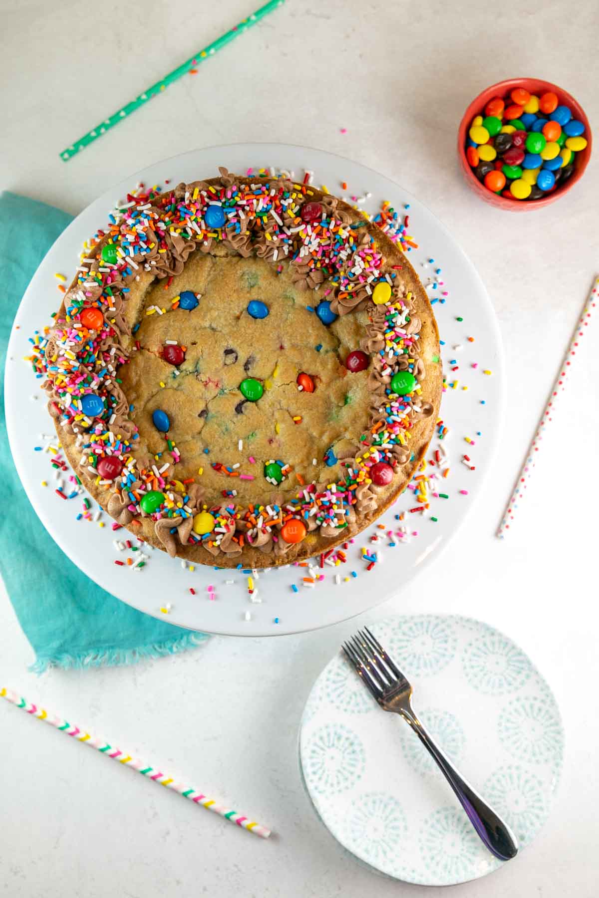 overhead view of the baked and decorated cookie cake