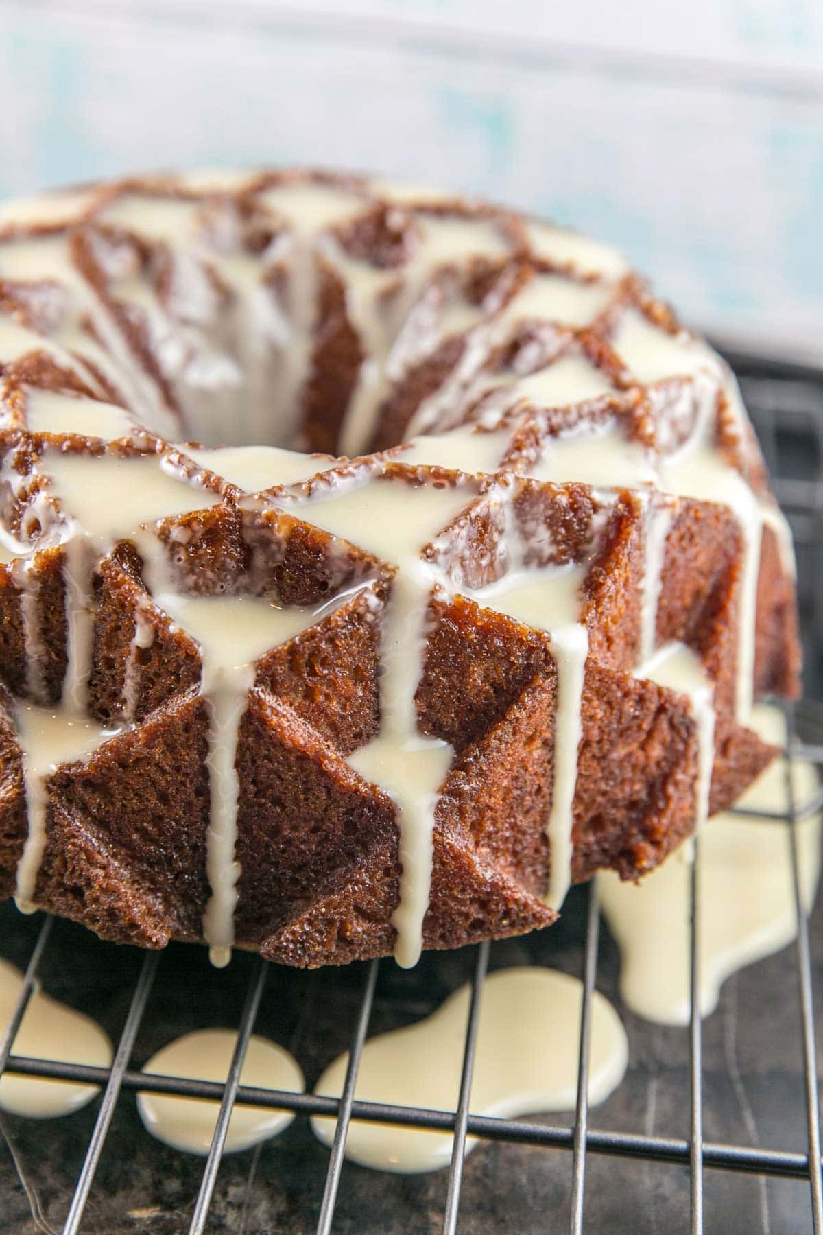 bundt cake covered in a dripping orange glaze