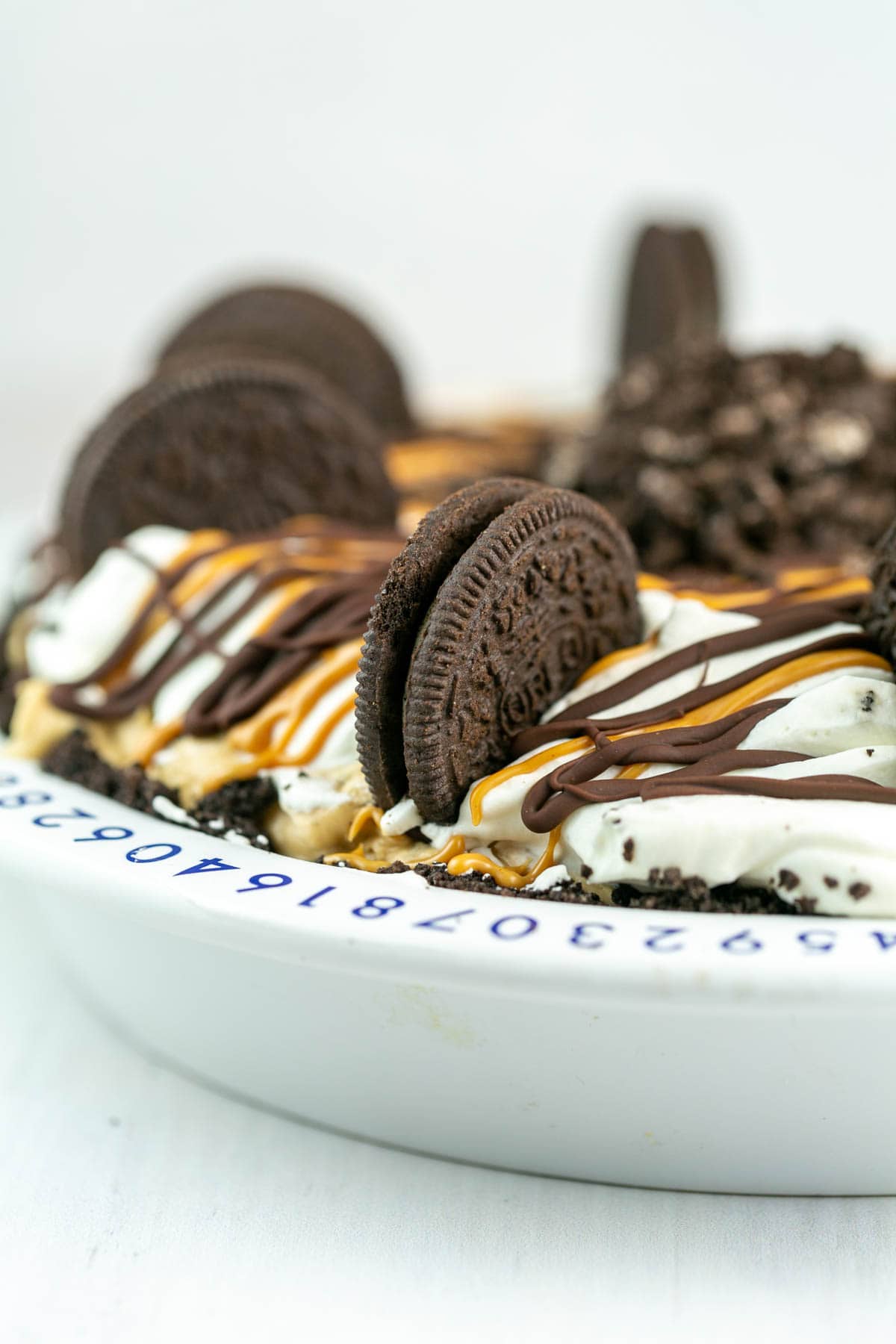 side view of a no bake pie with oreo cookies on top