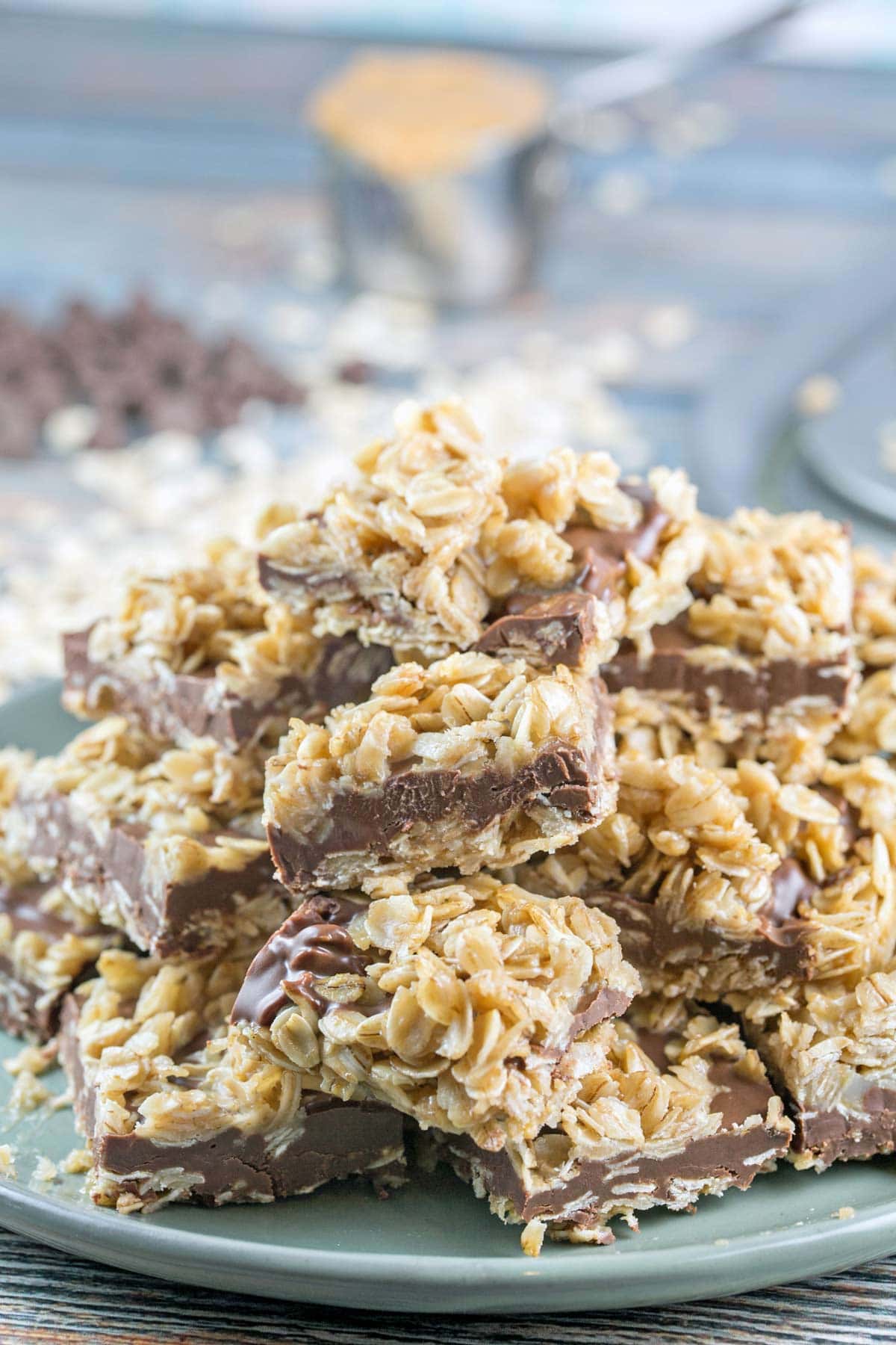oatmeal bars stacked high on a plate