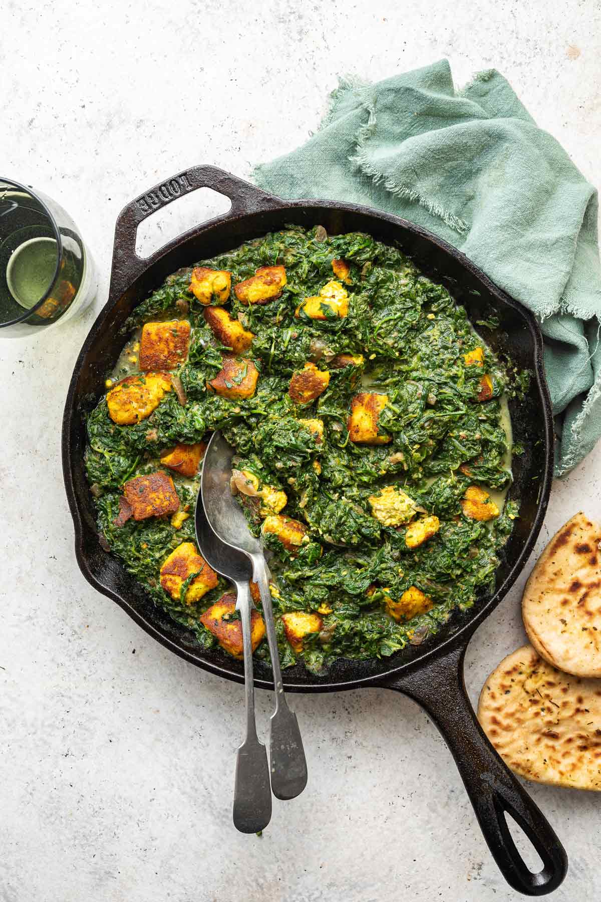 saag paneer in a cast iron skillet