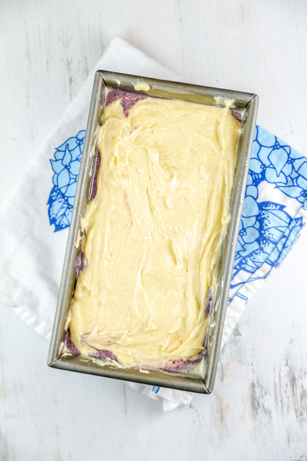 Pound cake batter in a loaf pan. 