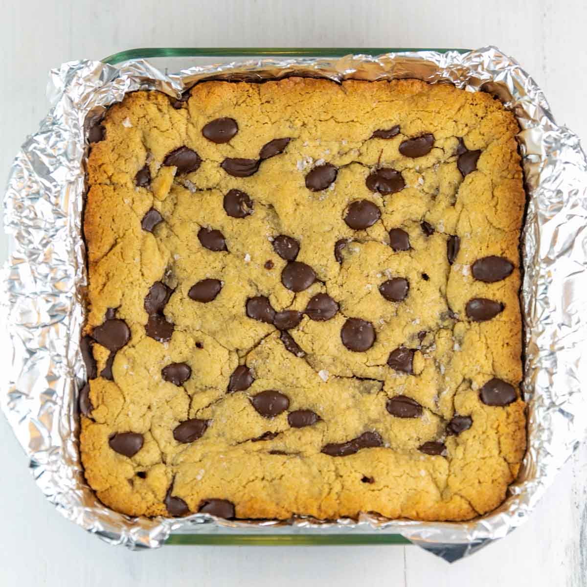 baked chocolate chip tahini blondies still in the pan