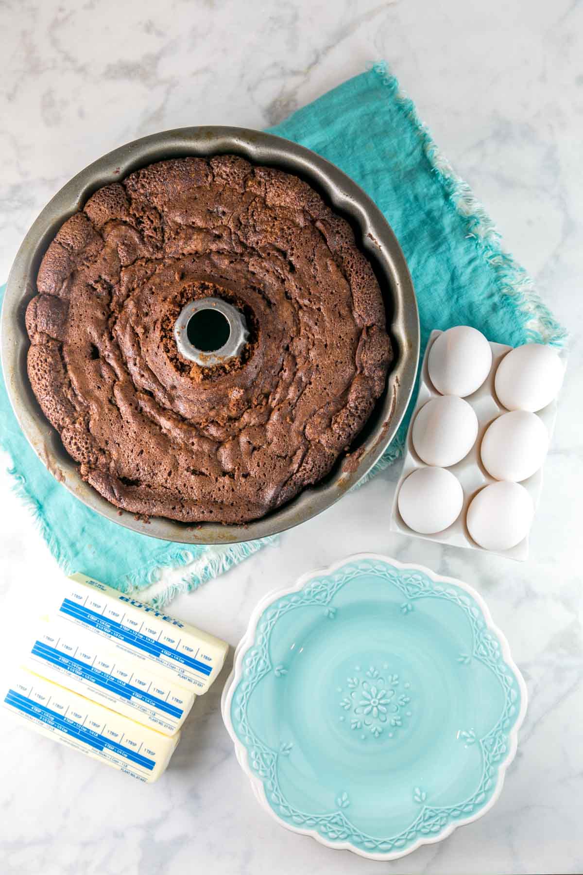 a dark chocolate pound cake in a bundt pan