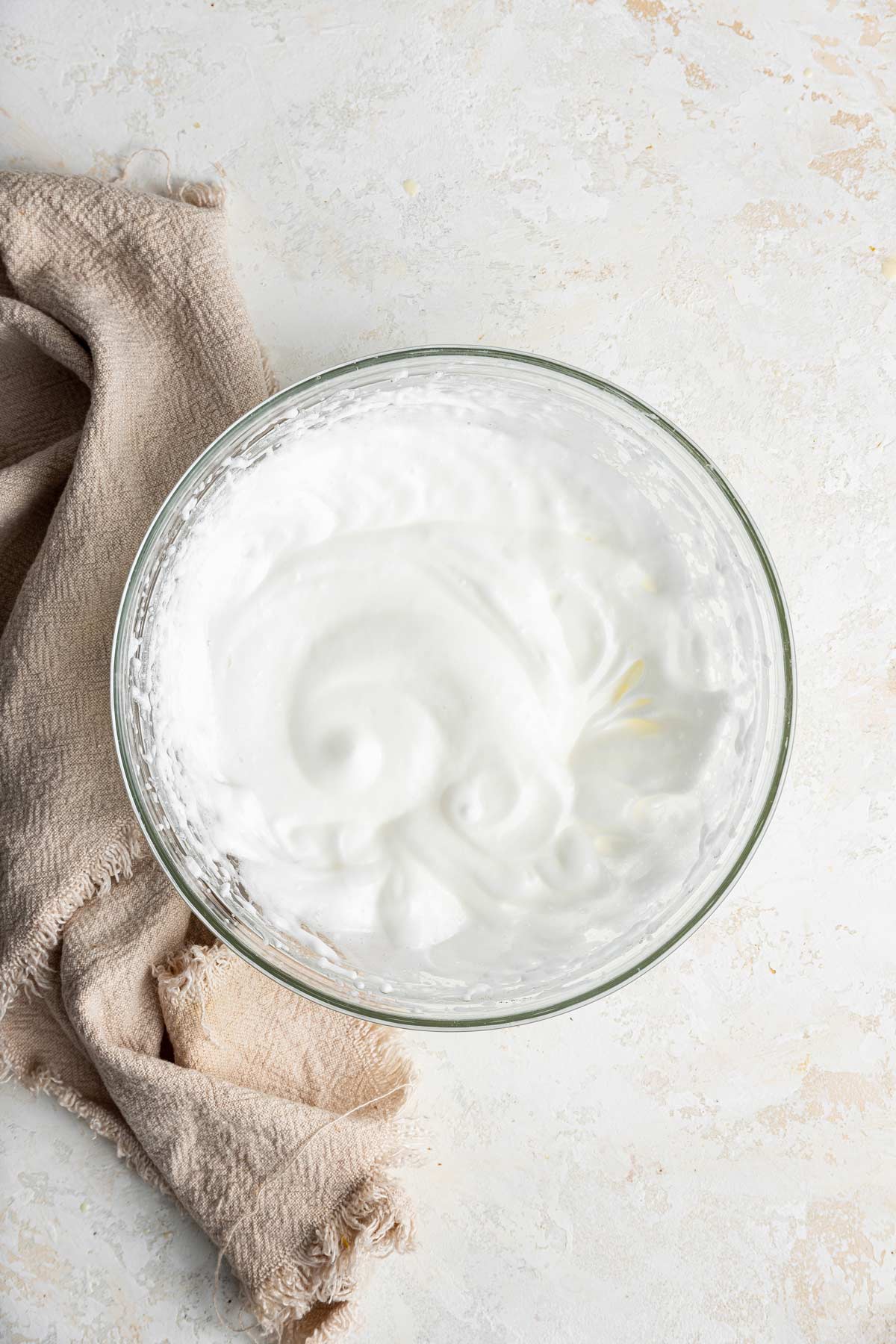 bowl full of fluffy whipped egg whites