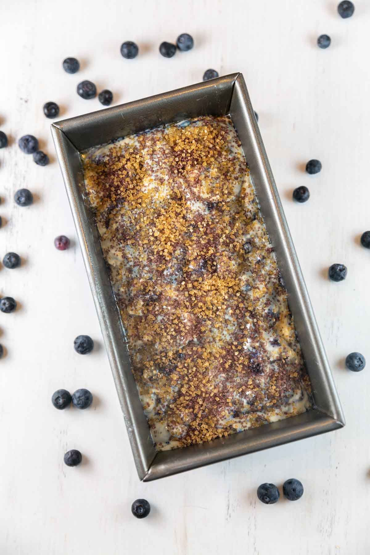 quick bread batter before baking in a metal loaf pan