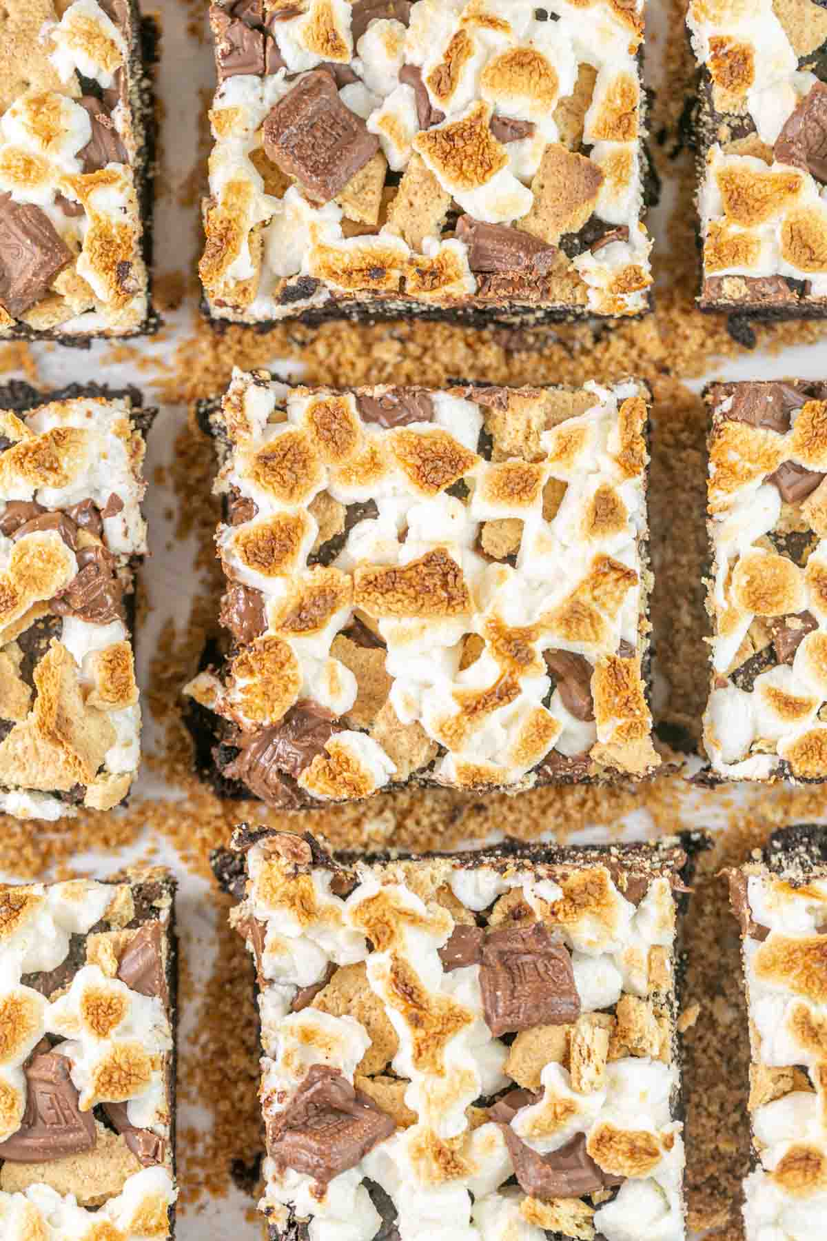 close up picture of s'mores brownies covered with golden brown toasted marshmallows