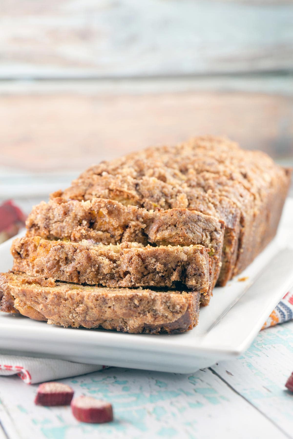 sliced quick bread covered with a cinnamon streusel crumble on top