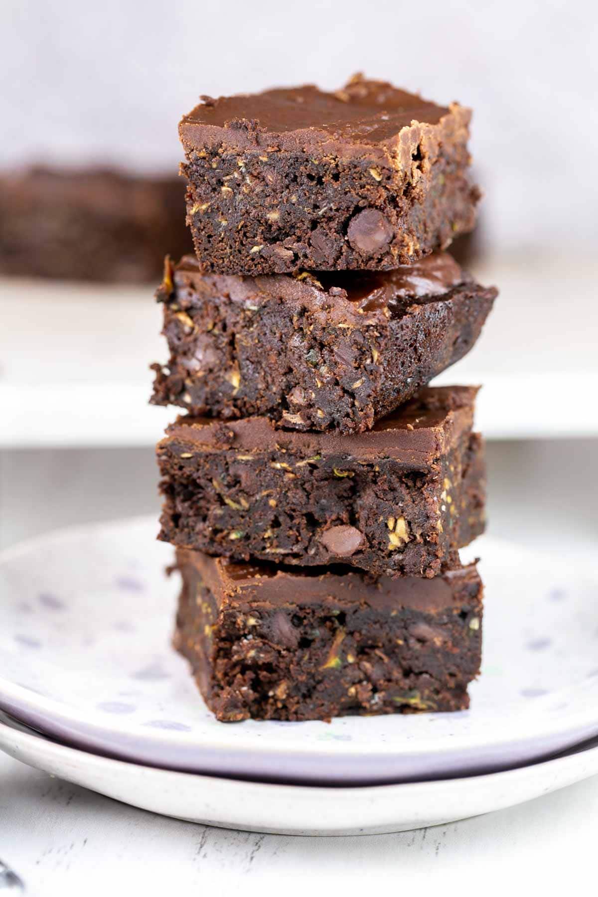 4 zucchini brownies in a stack