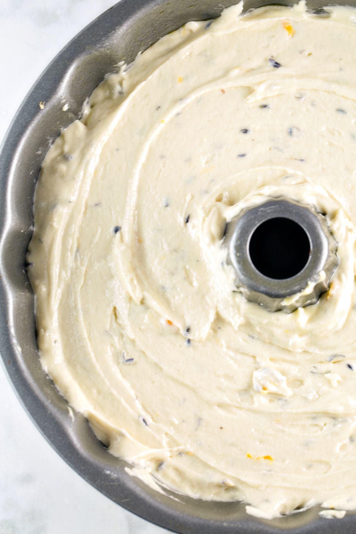 lemon lavender cake batter in a bundt pan