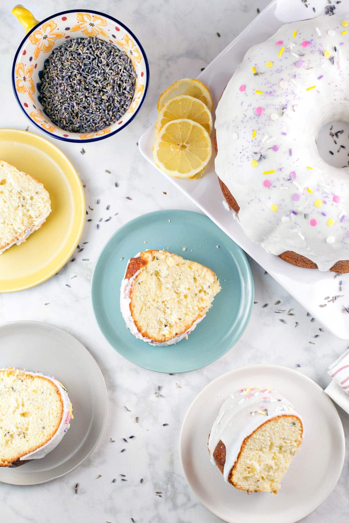 slices of bundt cake next to scattered culinary lavender