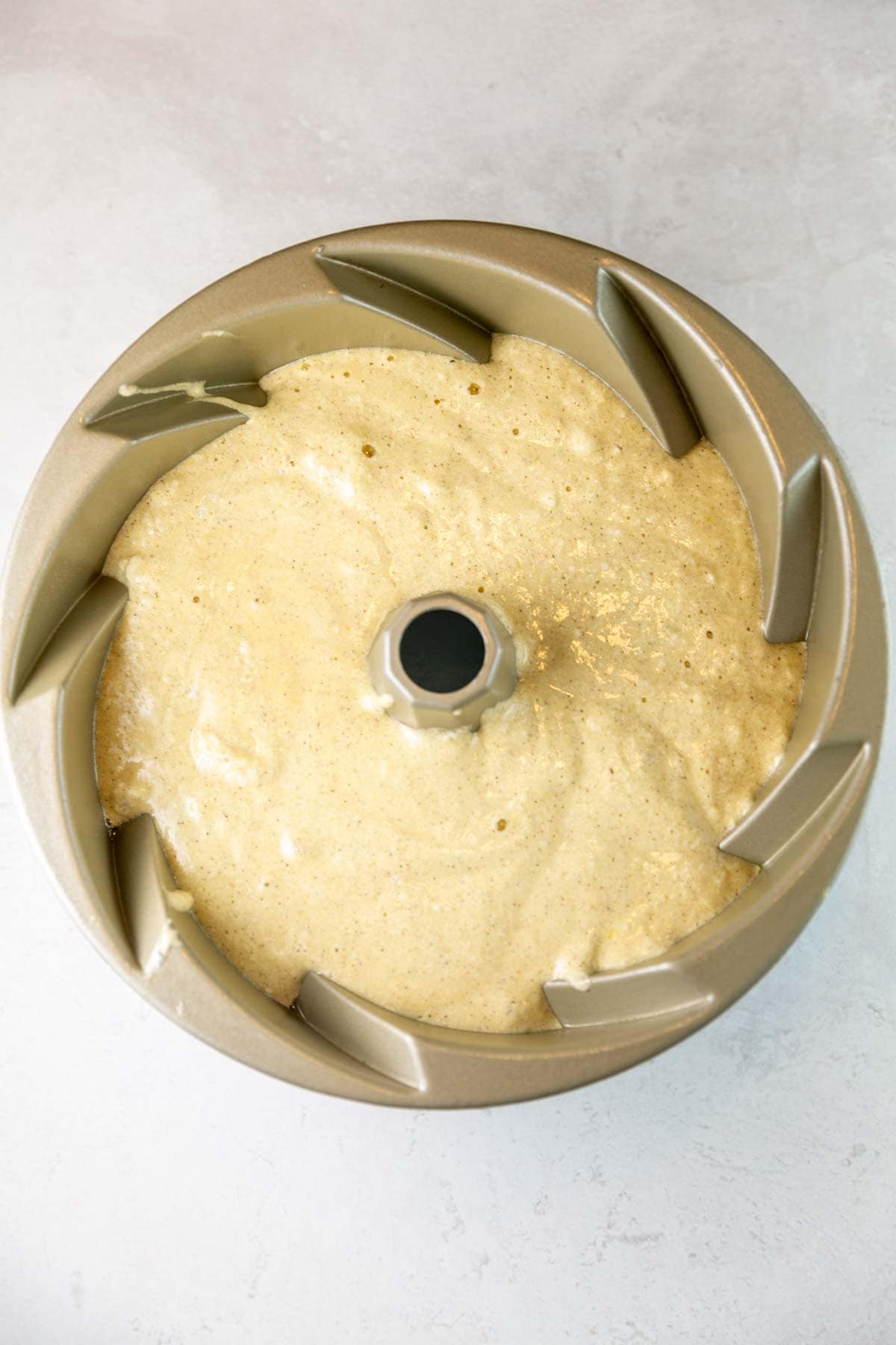 cake batter in a decorative bundt cake pan
