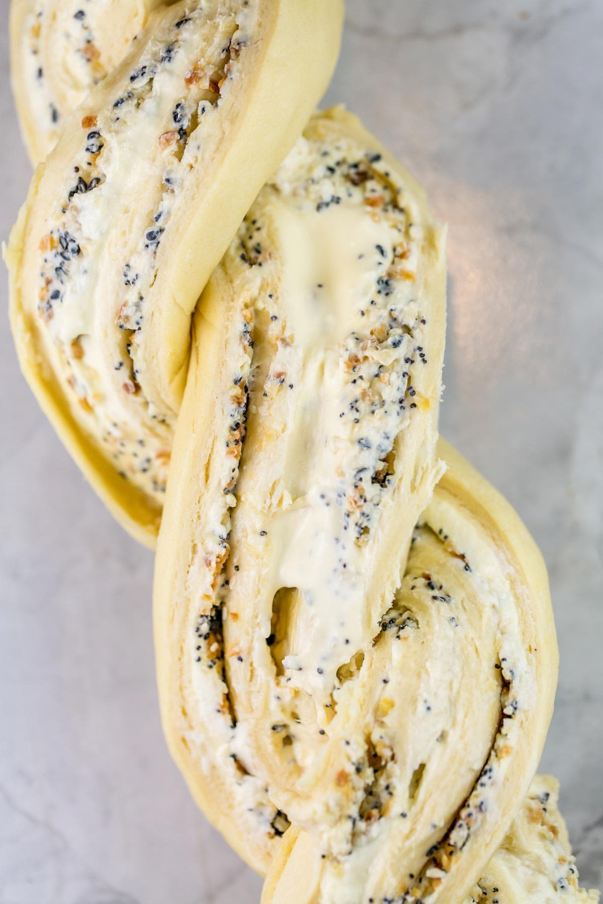 twisted babka dough showing the cream cheese filling