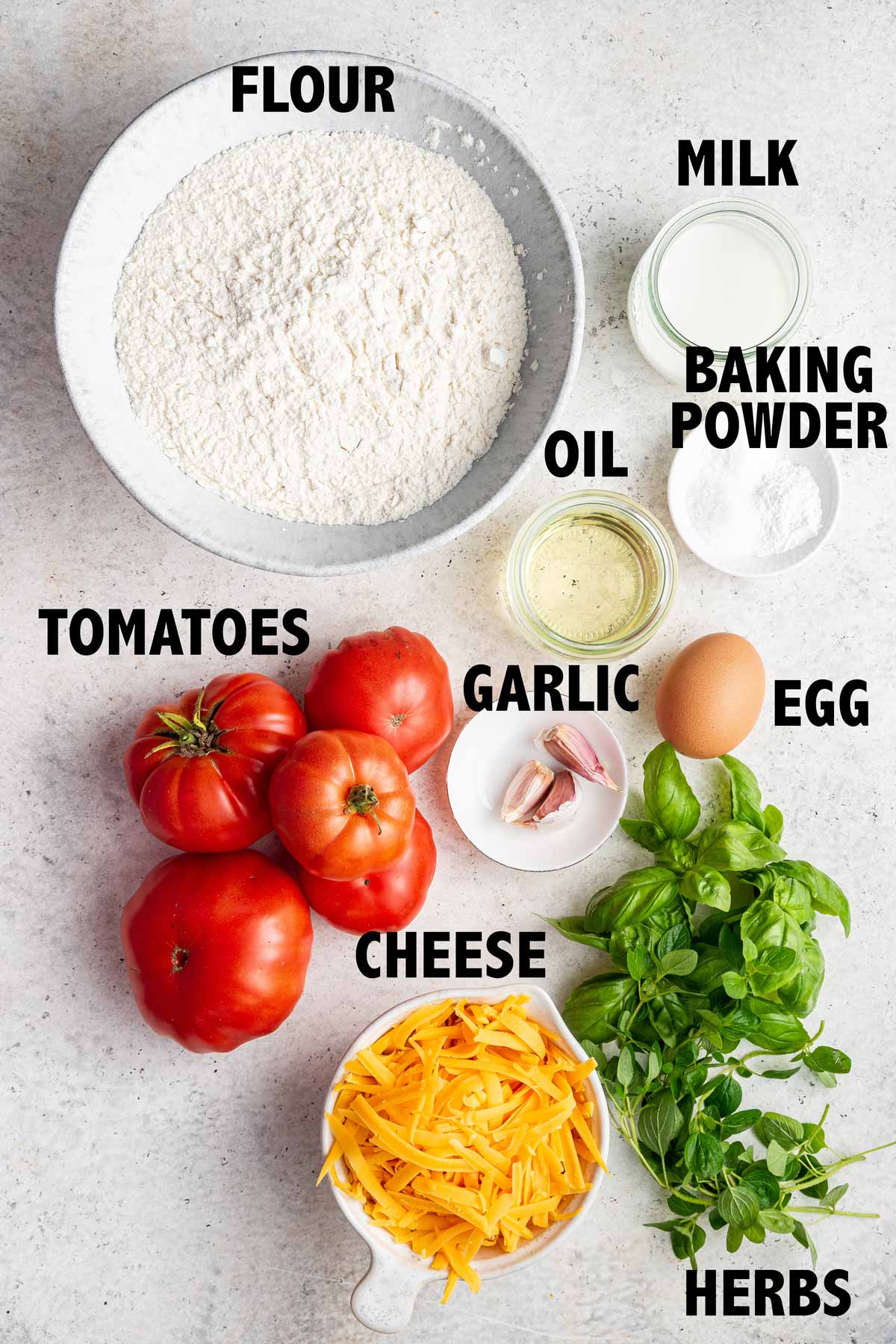 flatlay of ingredients used to make fresh tomato quick bread