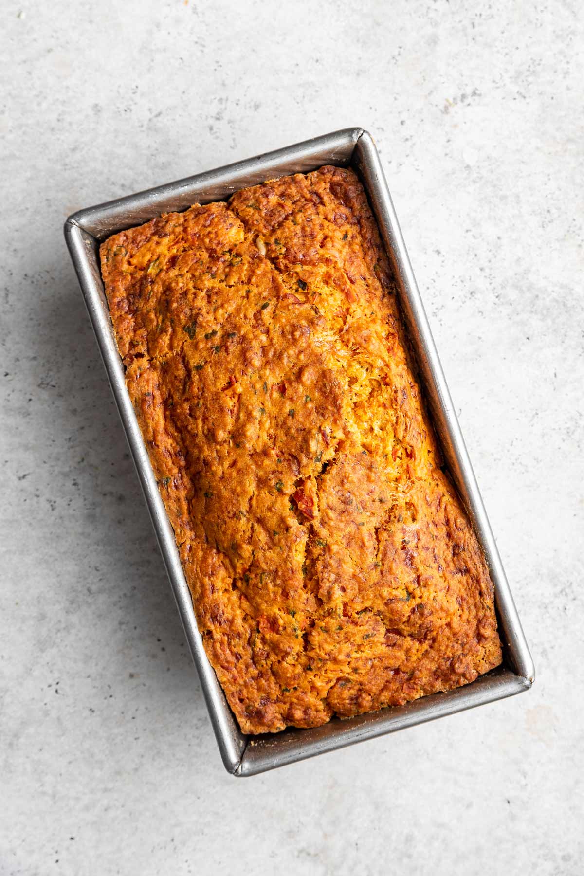 freshly baked quick bread made with fresh tomatoes