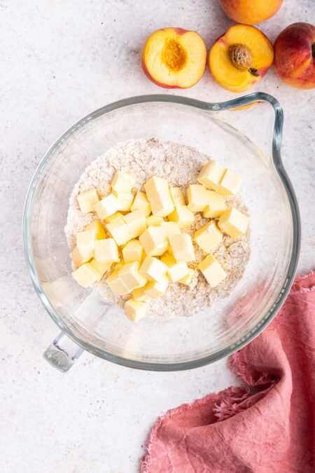 cubes of cold butter in a flour mixture