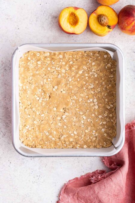 unbaked oatmeal crust pressed into the bottom of a baking pan