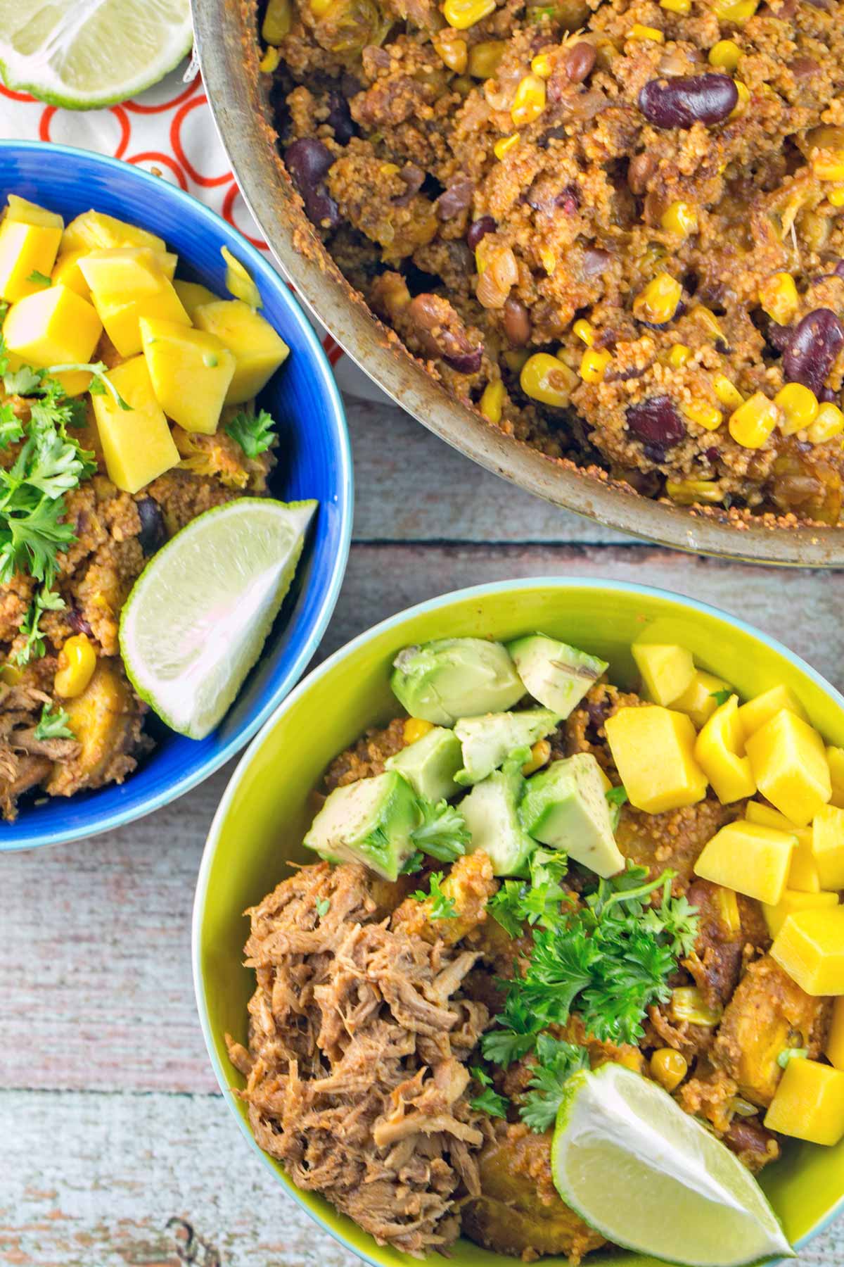one bowl couscous with mexican flavors in colorful bowls.