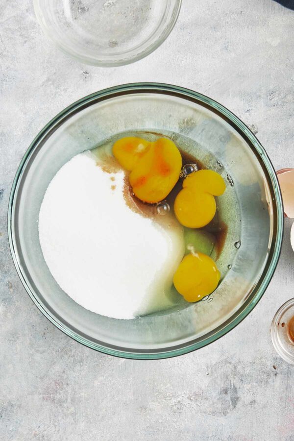 eggs and sugar in a mixing bowl.