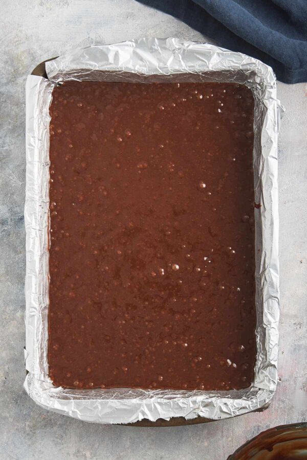 brownie batter in a 9x13-inch pan.