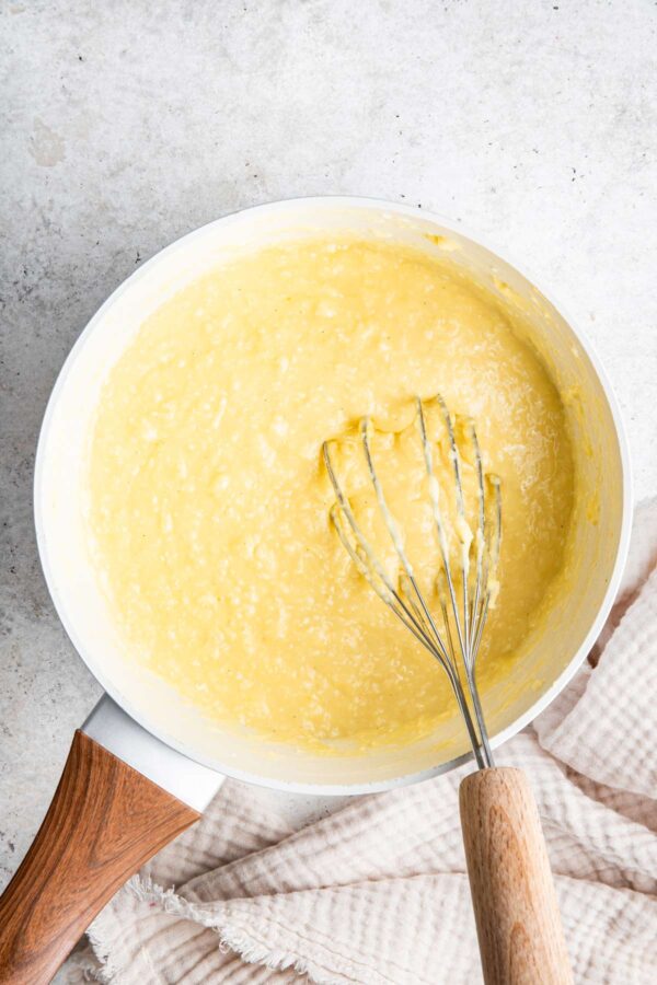 homemade coconut custard in a saucepan.