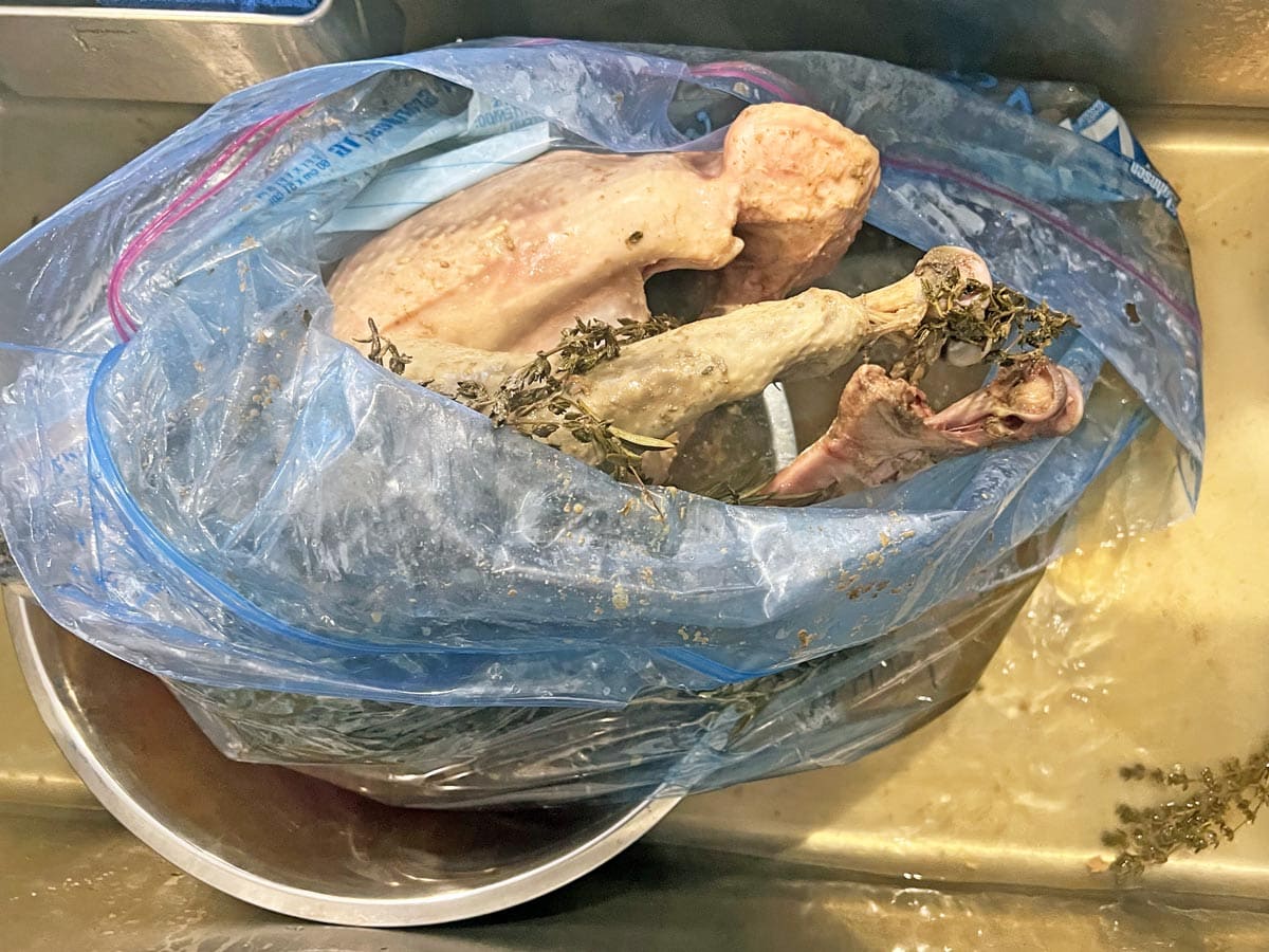 Turkey after being cooked in sous vide inside a bag that is opened.