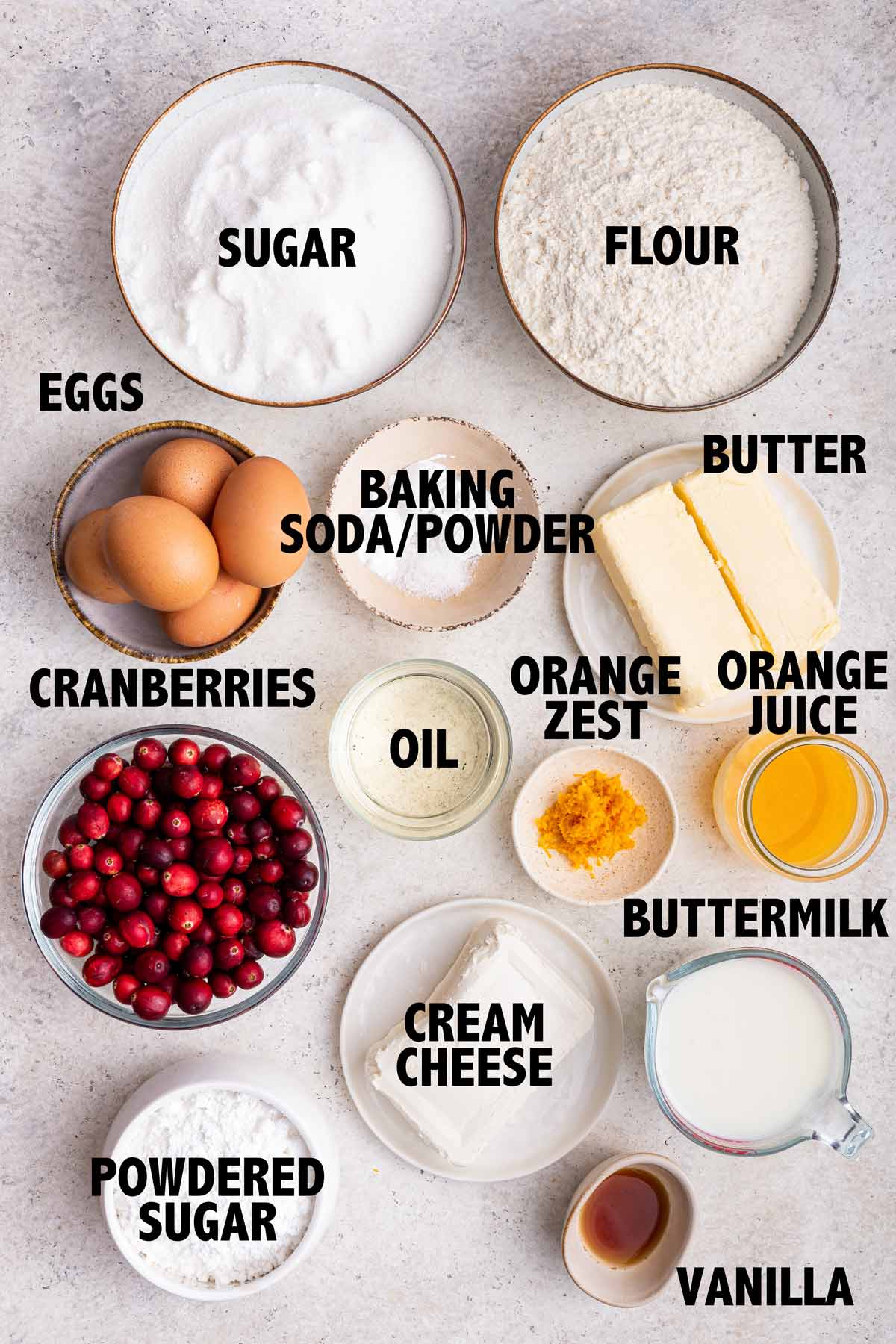 overhead view of all the ingredients used to make cranberry orange cake.