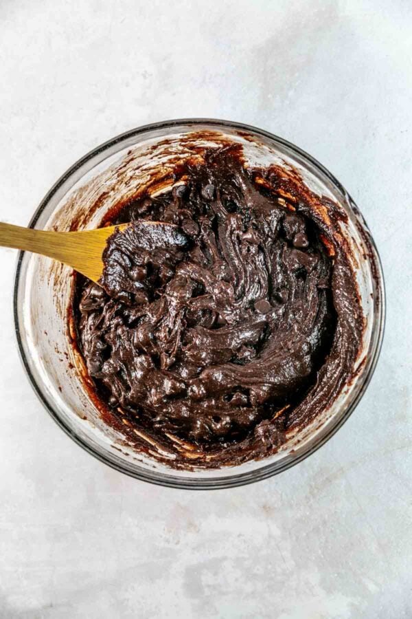 thick chocolatey brownie batter with blackberries mixed in.