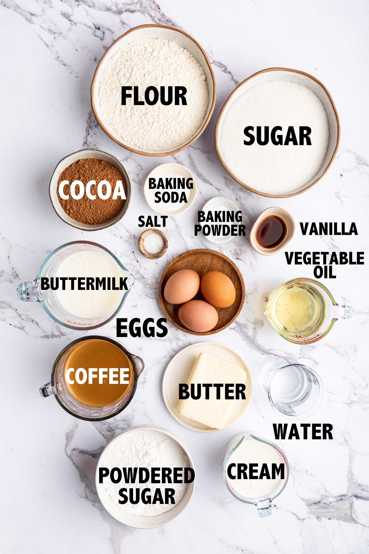 overhead view of ingredients used to make chocolate caramel cake.
