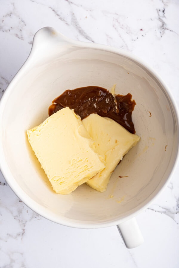 butter and homemade caramel sauce in a mixing bowl.
