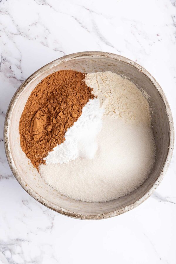 dry ingredients for a cake in a mixing bowl.