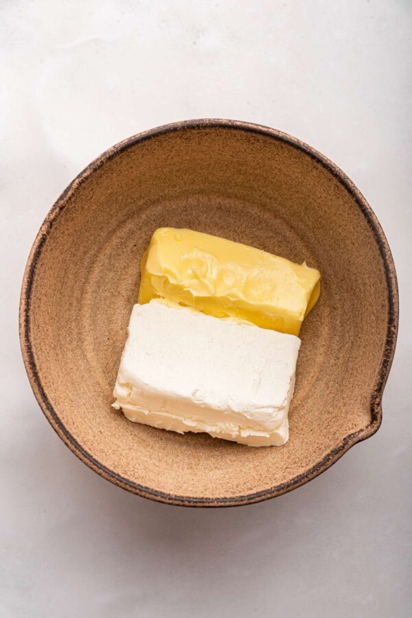 butter and cream cheese in a mixing bowl.