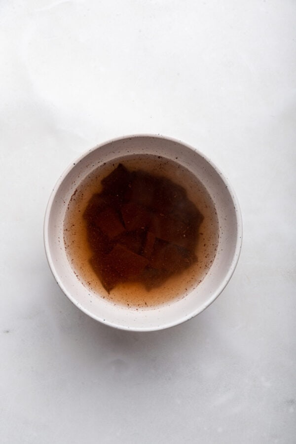 hot coffee and chopped chocolate in a bowl.