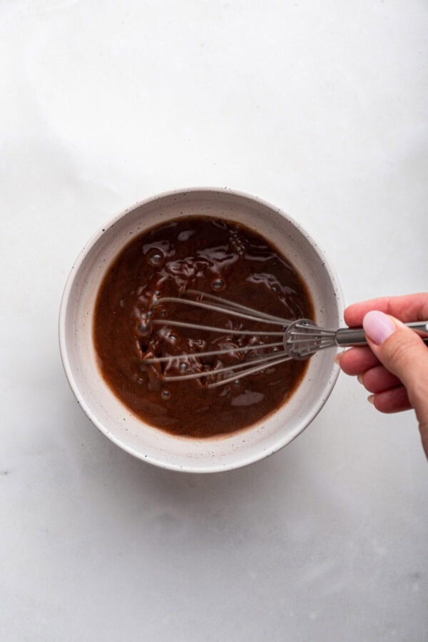 smooth melted chocolate in a mixing bowl.