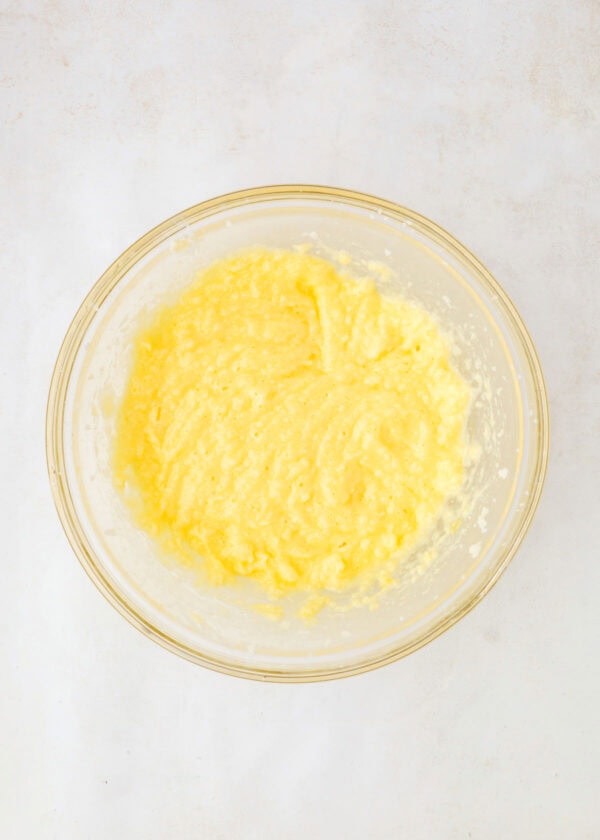 butter and sugar creamed together in a bowl.