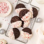 thick and chewy chocolate cookies dipped in white chocolate and sprinkled with peppermint.