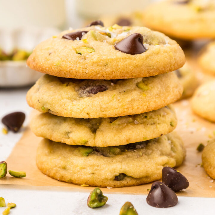 stack of four chocolate chip pistachio cookies.