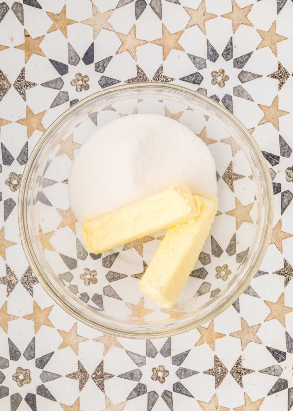 butter and sugar in a glass bowl.