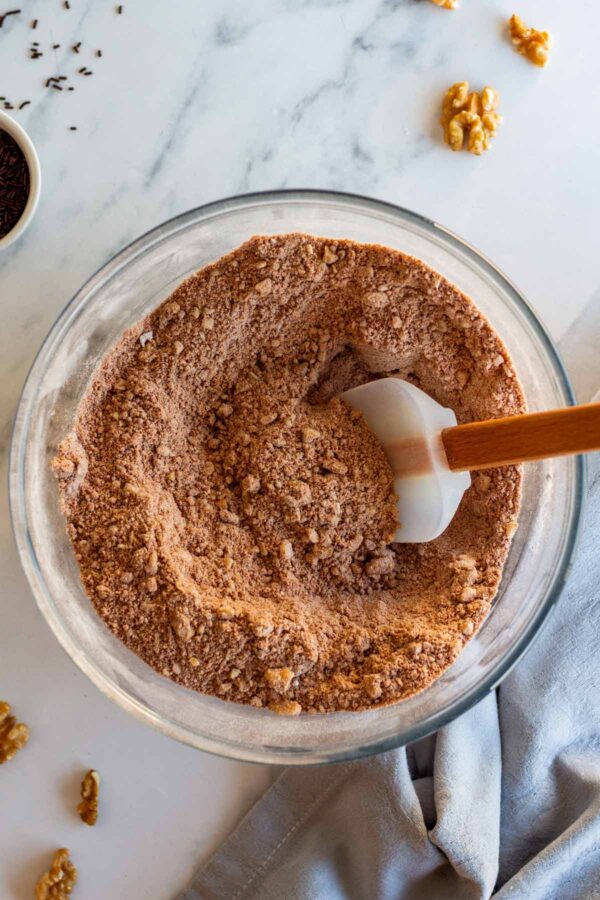 mixing the dry ingredients to make bourbon balls.