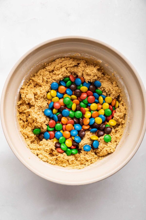 cookie dough with a big pile of M&Ms on top.